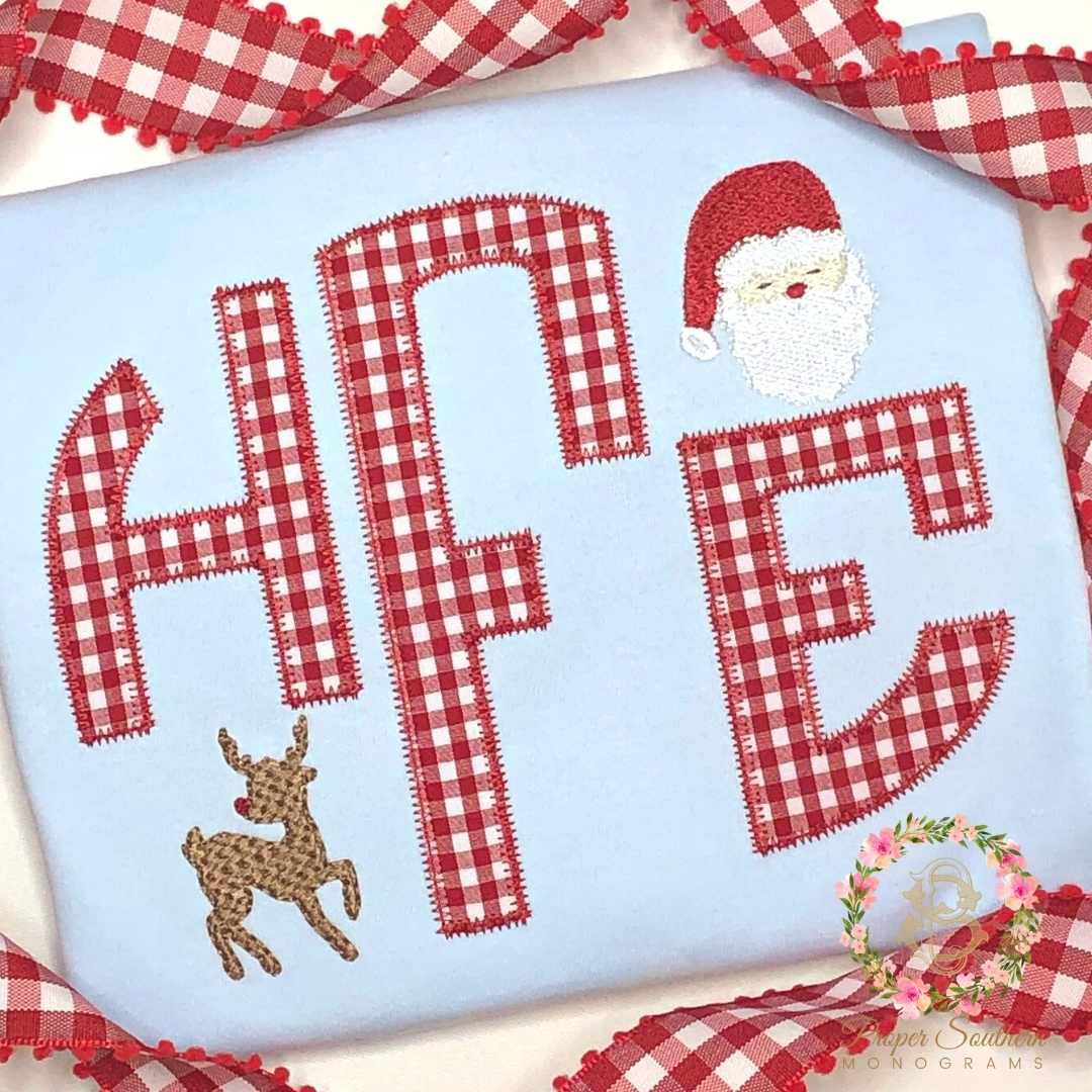 http://propersouthernmonograms.com/cdn/shop/products/huntermonogramchristmasshirtwithsantaandrudolph_1200x1200.jpg?v=1667994423